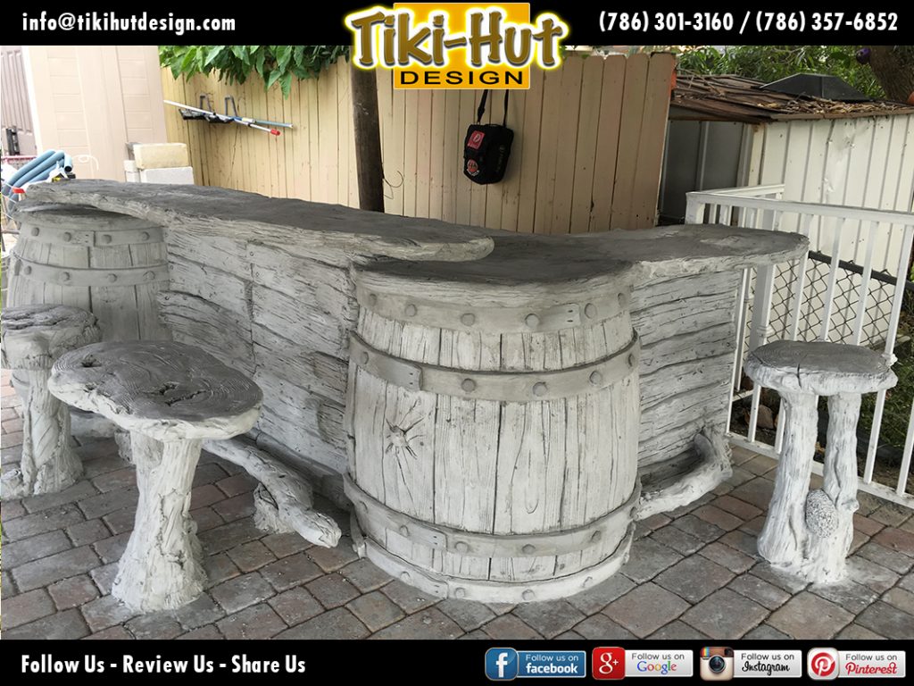 Custom-tiki-hut-desing-with-cement-barrel-tiki-bar-under-construction-detail