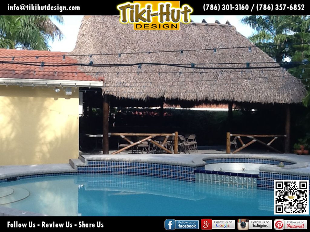 Tiki-Hut-Mounted-on-roof-of-a-house-with-pool-view-by-Tiki-Hut-Design-of-Miami